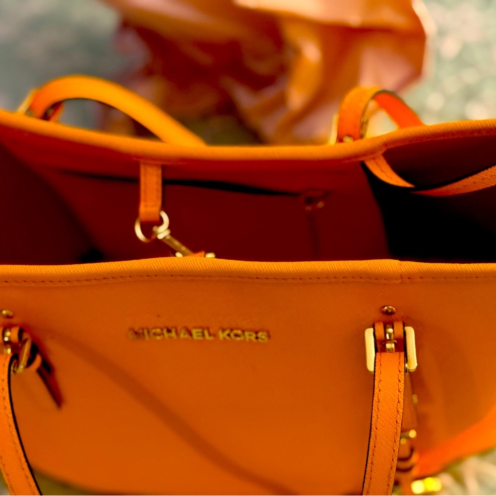Michael Kors Orange Leather Tote with Structured Design